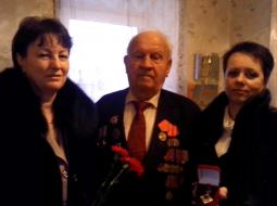 Делегація посадових осіб органів місцевого самоврядування відвідала ветерана Великої Вітчизняної війни