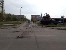 Щодо благоустрою та асфальтування території району